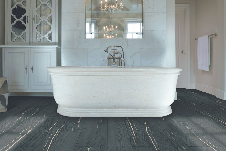 dark luxury vinyl in bathroom with porcelain tub, luxury vinyl by karastan